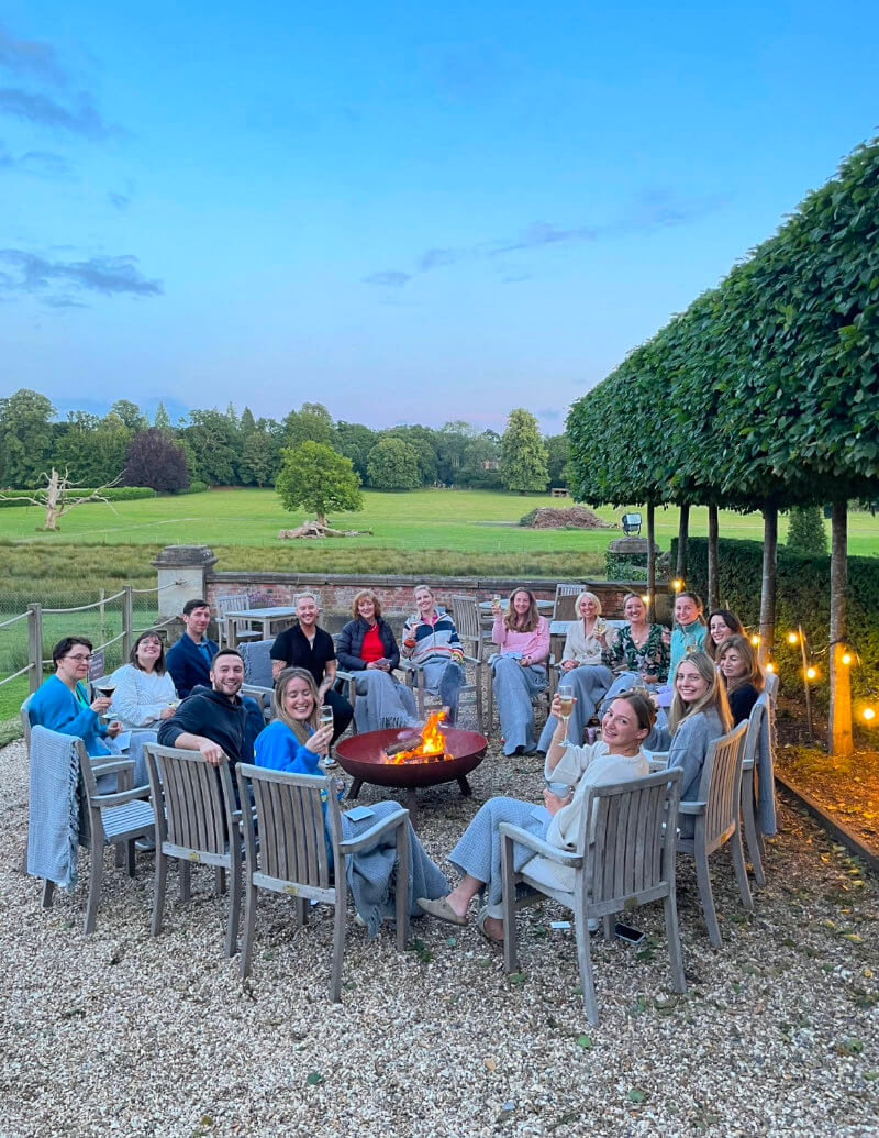 Group relaxing around the fire-pit